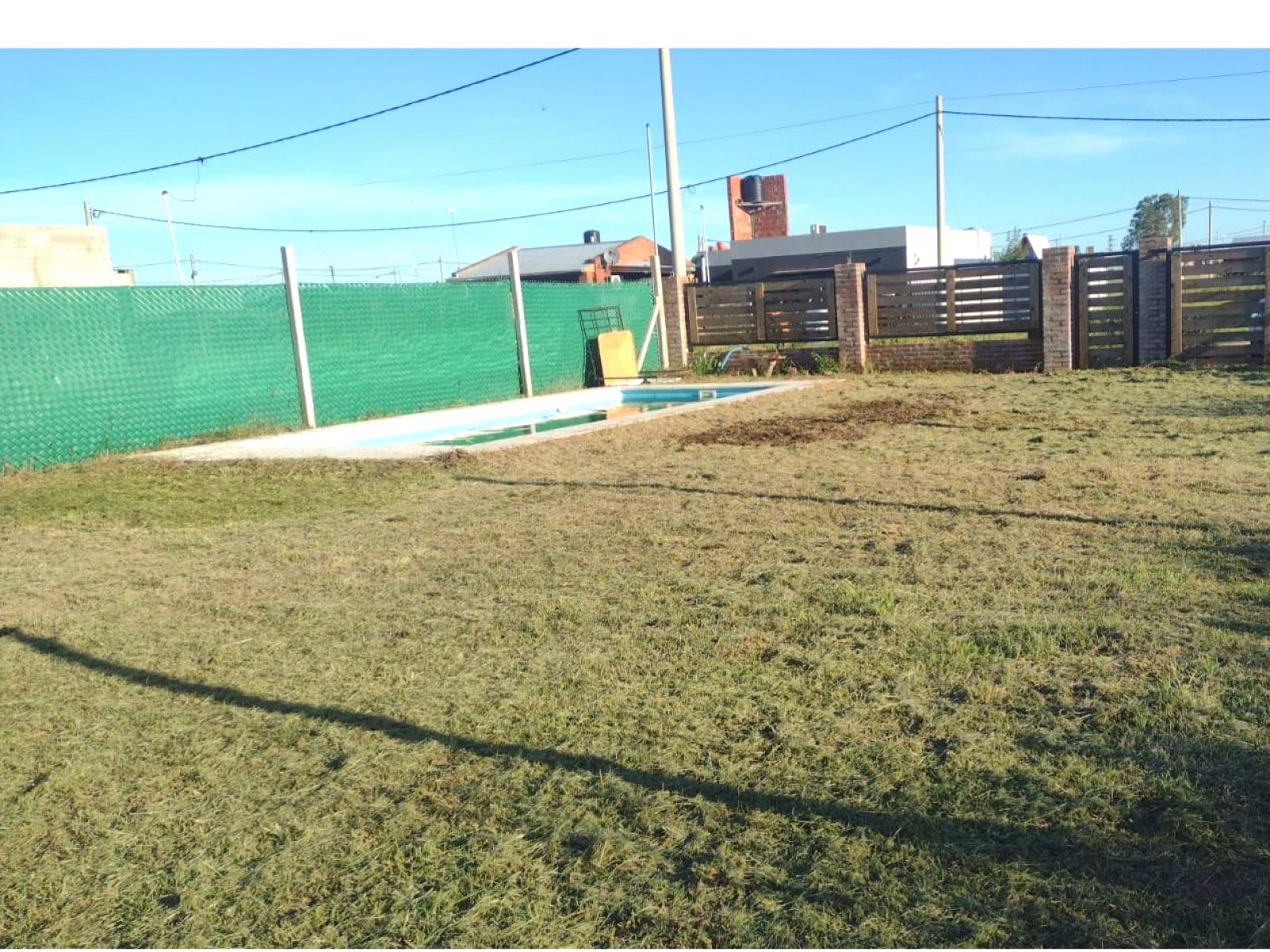 LOTE  CON PILETA  Y MEJORAS - PUERTO GRAL SAN MARTIN