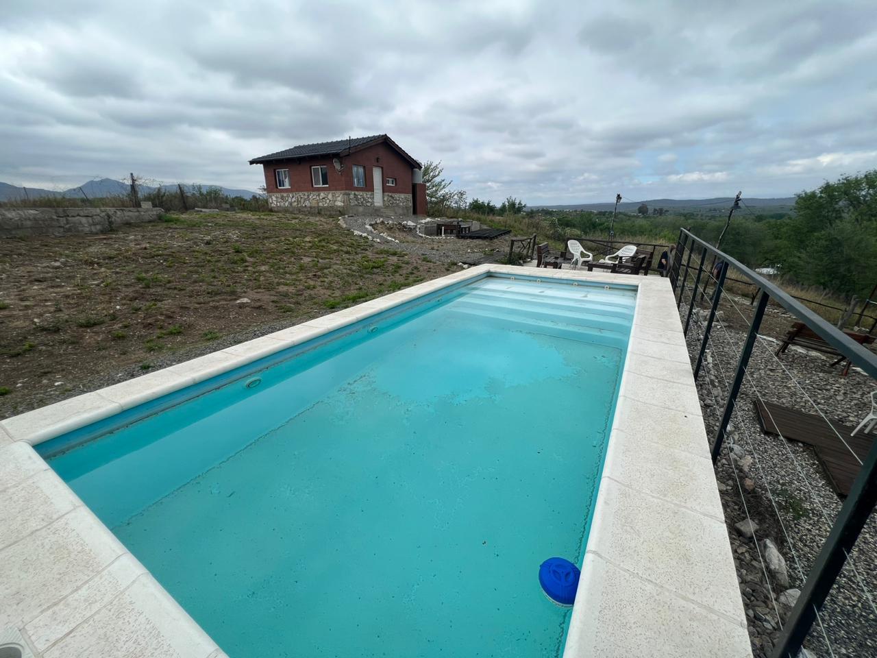 VENTA DE CASA MAS CABAÑA CON PILETA EN COSQUIN VISTA POSTAL A LAS SIERRAS  A 1 KM DE RN38 EN UN ENTORNO DE PAZ Y NATURALEZA REF: 1921